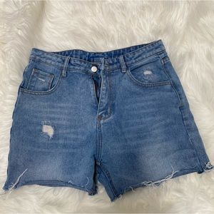Medium wash denim shorts size M or US4